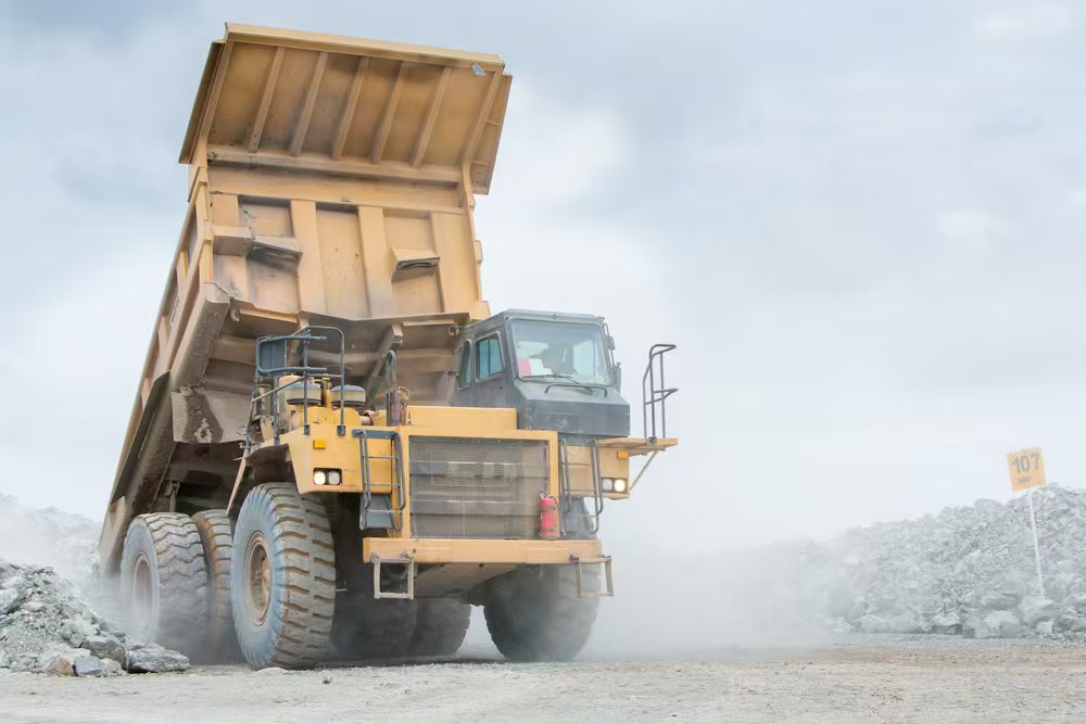 Mining dump truck operating on a haul road with 29.5-25 tyre application requirements